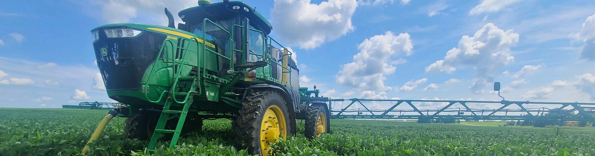 filling a sprayer with pesticide tank mix before application